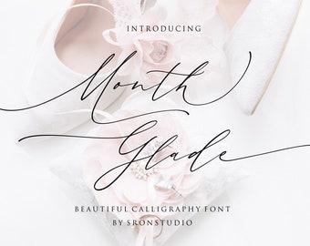 Month Glade Calligraphy Font – Script Font with Tails