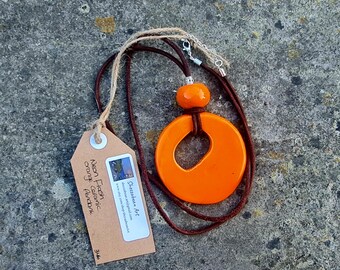 Neon Orange Ceramic Pendant on Blue Leather Cord. Silver Plated Lobster Clasp with Extender. Handmade. Quirky. Statement Piece.