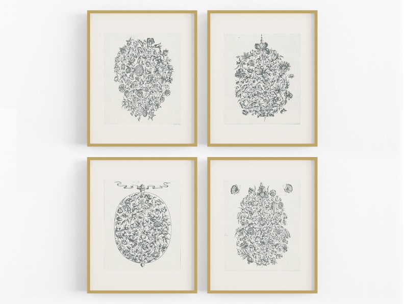 May include: Set of four framed black and white prints featuring intricate floral designs. Each print is framed in a simple gold frame.