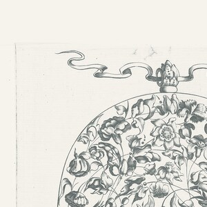 May include: A black and white illustration of a circular design with a floral motif. The design features a crown at the top and a ribbon flowing from the crown.