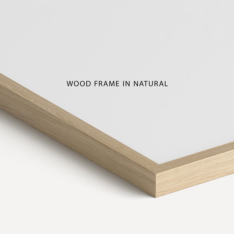 May include: Close-up of a natural wood frame. The frame is light brown and has a smooth finish. "WOOD FRAME IN NATURAL" is printed in black text on the white background.
