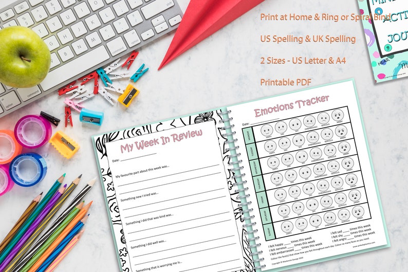 May include: A printable PDF journal with a green and white cover featuring a weekly review section and an emotions tracker. The emotions tracker has a grid of circles with different facial expressions for kids to color in.