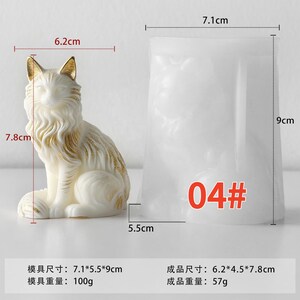 May include: A white cat figurine with gold accents, measuring 6.2 cm wide and 7.8 cm tall. Beside it is a white mold with the number "04#" printed on it. The mold is 7.1 cm wide and 9 cm tall. The cat figurine weighs 57g.