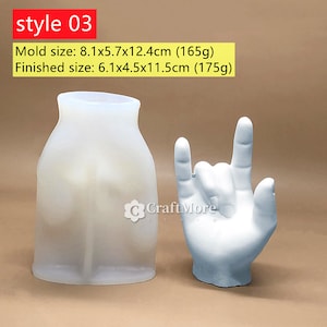 May include: Two silicone molds for making concrete crafts. The mold on the left is a tall, cylindrical shape. The mold on the right is a hand making the rock and roll hand gesture. The text on the image reads "style 03", "Mold size: 8.1x5.7x12.4cm (165g)", and "Finished size: 6.1x4.5x11.5cm (175g)".