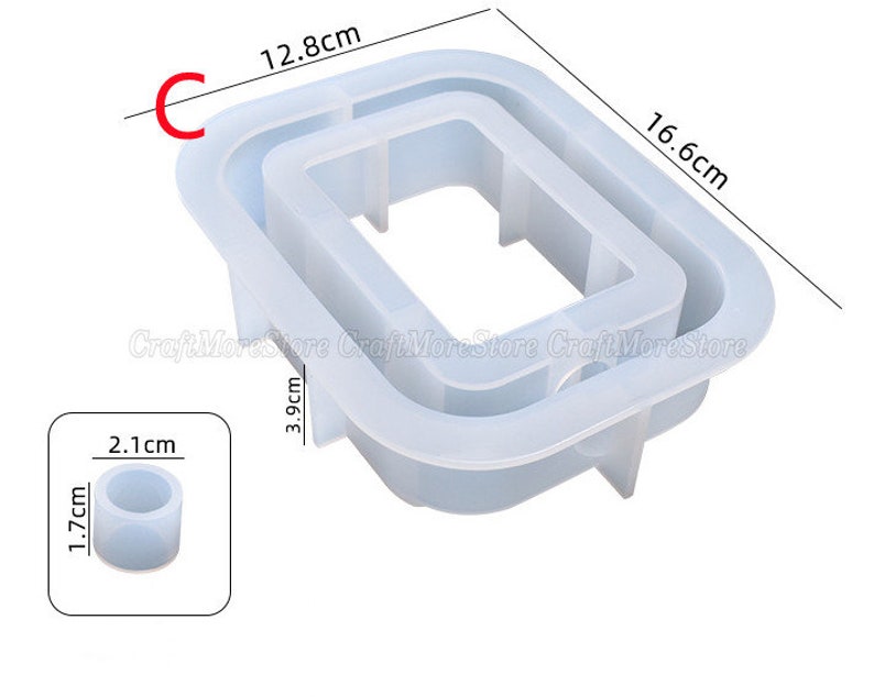 May include: A clear silicone mold for making resin crafts. The mold is shaped like a rectangle with a smaller rectangle inside. The mold measures 12.8 inches by 16.6 inches. There is also a smaller round mold that measures 1.7 inches in diameter and 2.1 inches in height.