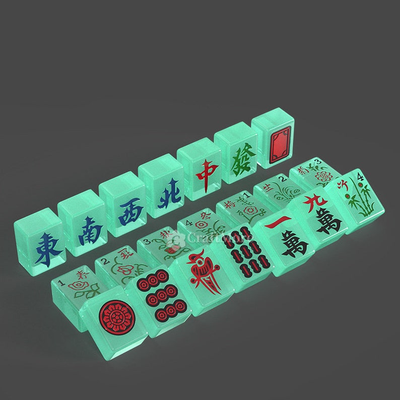 May include: A set of 14 green mahjong tiles with Chinese characters and symbols. The tiles are arranged in a diagonal line, with the East, South, West, and North wind tiles at the bottom.