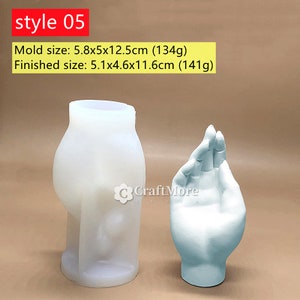 May include: White silicone mold and a finished hand-shaped sculpture made from the mold. The mold is 5.8 inches by 5 inches by 12.5 inches and weighs 134 grams. The finished sculpture is 5.1 inches by 4.6 inches by 11.6 inches and weighs 141 grams.