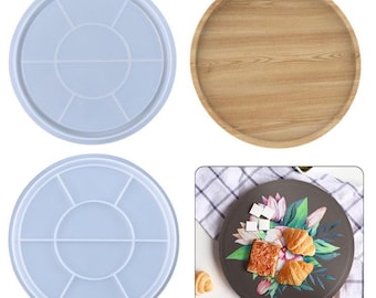 May include: Two round silicone molds with seven sections each, one wooden tray, and one round plate with a floral design and two croissants on top.