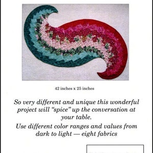 May include: A colorful spiral table runner pattern with instructions for making the runner. The runner is 42 inches by 25 inches and uses eight fat quarters of fabric.