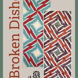 May include: A quilt pattern called "Broken Dishes" by Cindi McCracken Designs. The pattern is for a 18x24 inch quilt and is foundation paper pieced. The pattern shows two different colorways of the quilt, one with red, white, and teal fabrics and the other with red, white, and brown fabrics.