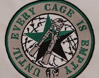 Embroidered patch: "until every cage is empty" (full embroidery)
