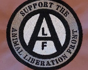 Embroidered patch: motif and writing "support A.L.F." (full stick)