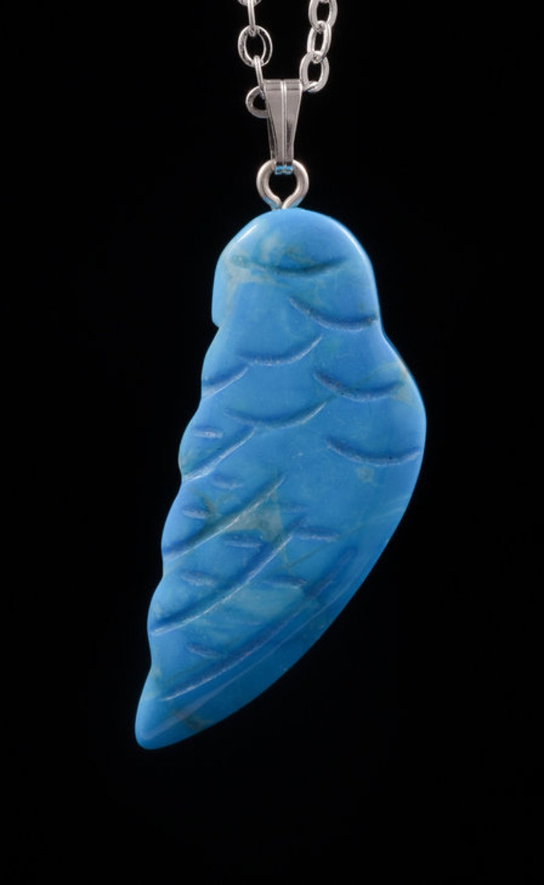 Ange Howlite blue wing pendant