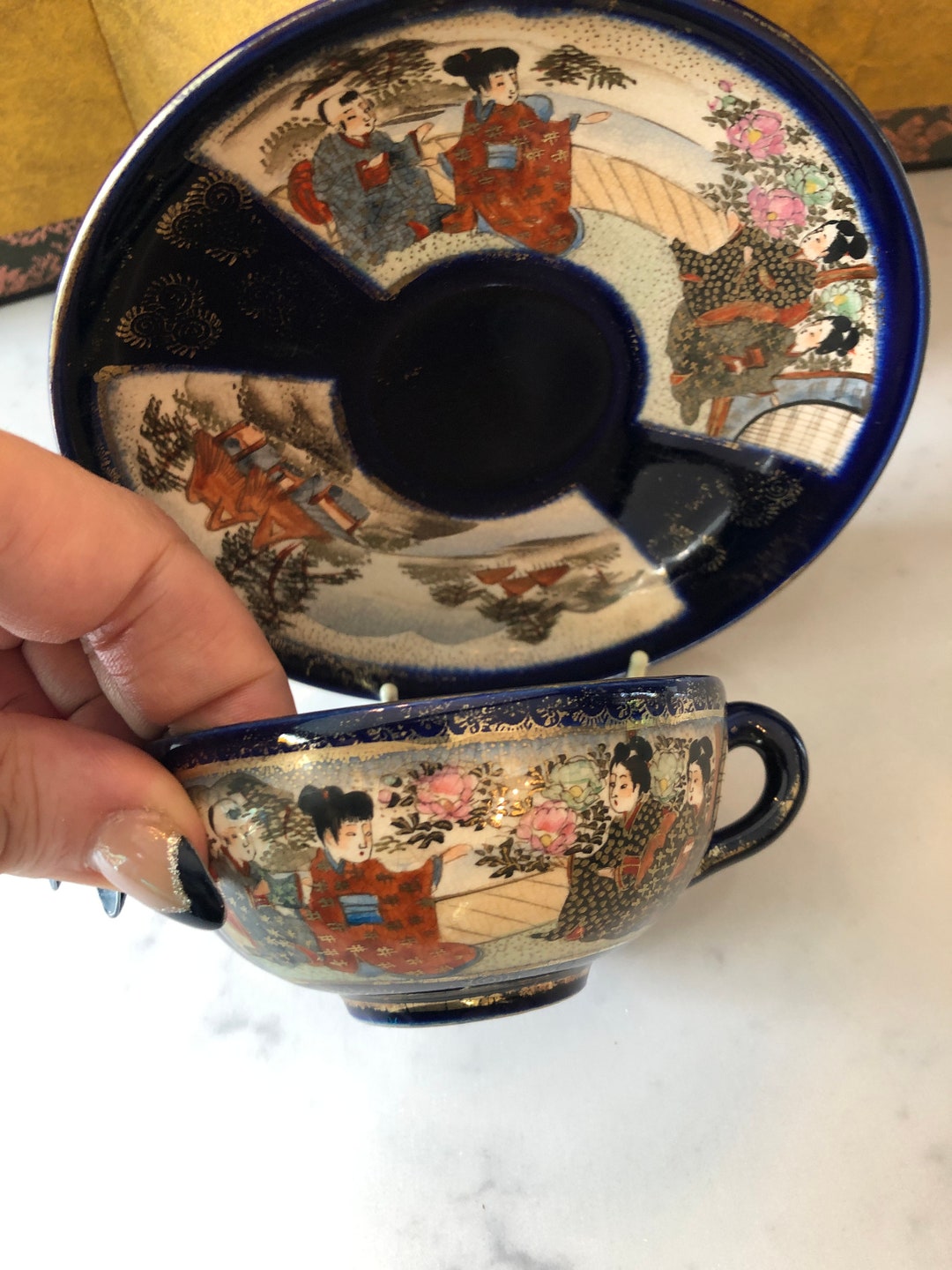 An Antique Japanese Satsuma Cup and Saucer, Glazed in Deep Cobalt Blue