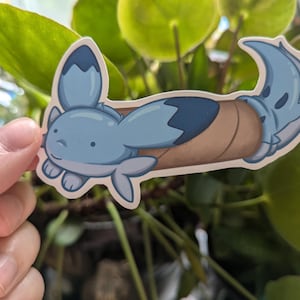 Palworld-chillets geplakt in een buis gestanste sticker