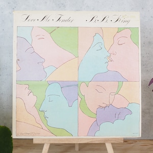 May include: A vintage vinyl record album cover featuring a colorful illustration of four couples kissing. The album is titled "Love Me Tender" by B.B. King.