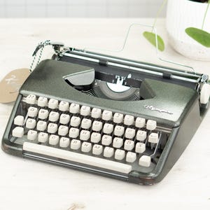 1-3 DAYS QUICK SHIPPING pink professionally maintained working qwertz Olympia Splendid - black  - With new ink ribbon and free shipping
