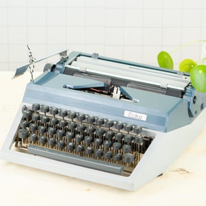 1-3 días ENVÍO RÁPIDO A TODO EL MUNDO mantenido profesionalmente en funcionamiento Erika - Años 80 - Con nueva cinta de tinta qwerty