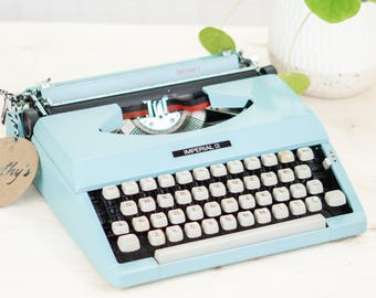 1-3 days QUICK SHIPPING WORLDWIDE professionally maintained working blue Royal Signet portable typewriter, 1970s - new inkribbon qwerty