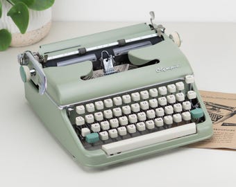 Mint green Olympia SM5 Typewriter – 1960s QWERTZ Keyboard, Working Condition