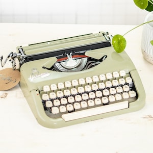 Máquina de escribir portátil Princess Standard, años 50, con cinta de tinta nueva, en perfecto estado, envío rápido a todo el mundo, con mantenimiento profesional, qwertz