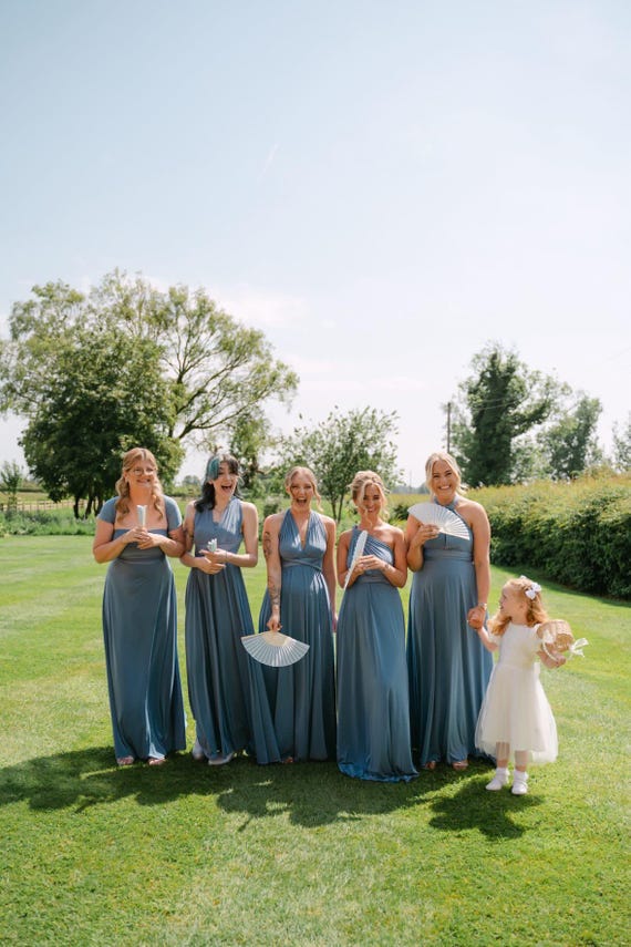 blue green bridesmaid dresses Made in USA Teal Infinity Dress Multiway Convertible Dress Made in USA +36 Colors 4 way Stretch for maximum versatility and ultimate comfort Non Clingy with Cooler Feel Polyester spandex blend Made in USA Kennedy Blue Sarah bridesmaid dress
