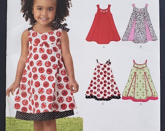 Childs and Girls Flared Sundress Toddler Trapeze Swing Dress New Look 6974 Sewing Pattern 2010 Size 1/2 to 4 UNCUT