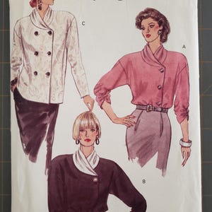 May include: A sewing pattern for three different tops. The pattern is called "Very Easy Very Vogue" and the pattern number is 7948. The pattern is for sizes 14-16-18.