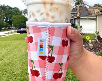 Rosa und rote Kirschen Kaffee Isolierhülle