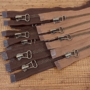 YKK Open-ended One-way separating zipper, 5mm brass teeth, decorative pull