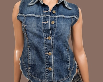 May include: A blue denim vest with a button-up front and frayed edges. The vest has a collar and is sleeveless.