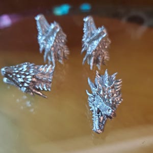 4 Pack - Pre-Threaded Dragon Head Tire Valve Caps.  Fits Schrader Valves.