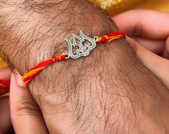 Pulsera de cordón de algodón hecha a mano con rakhi de plata esterlina