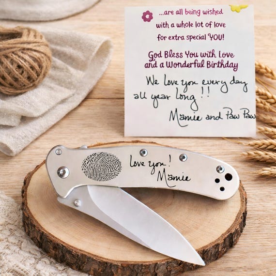 A memorial knife engraved with a loved one's actual fingerprint or handwriting — emotionally charged, one-of-a-kind keepsake that no mass producer can replicate.