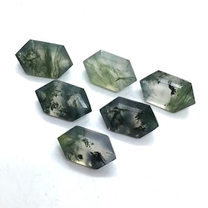 May include: Six green and white moss agate cabochons in a hexagonal shape. The stones are translucent and have a natural, organic pattern.