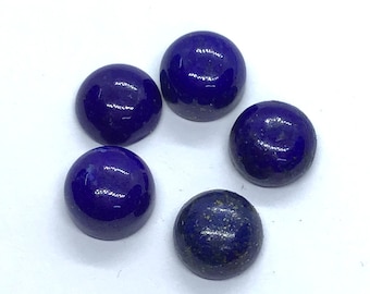 May include: Five round, blue lapis lazuli cabochons with gold flecks. The cabochons are smooth and polished.