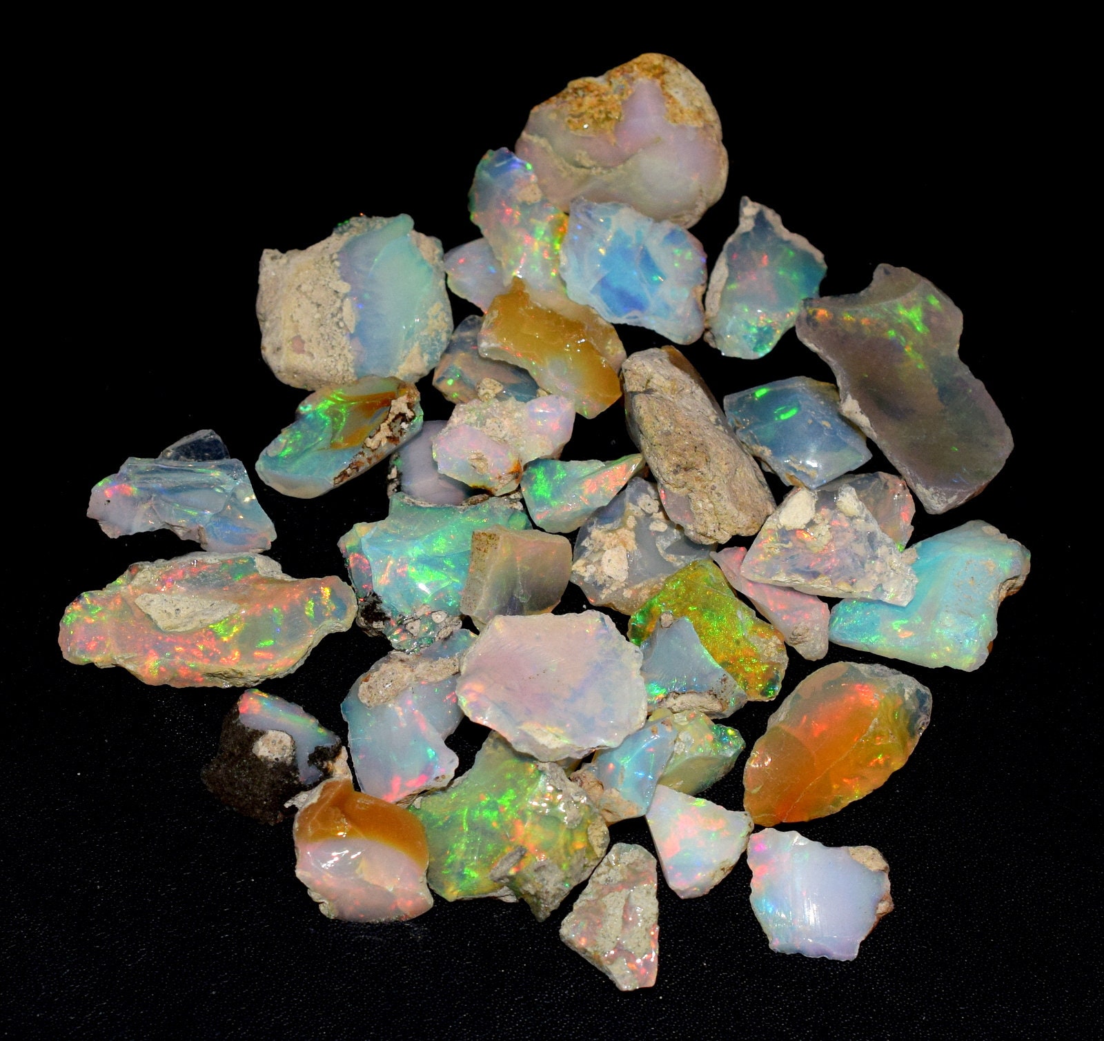 Fine Quality Raw Opal Welo Opal Rough Stone Ethiopian Opal Rough Amazing MultiColor Rough Direct From Mines At Wholesale Price 100% Natural Fine Quality Raw Opal Welo Opal Rough Stone Ethiopian Opal Rough Amazing MultiColor Rough Direct From Mines At Wholesale Price 100% Natural