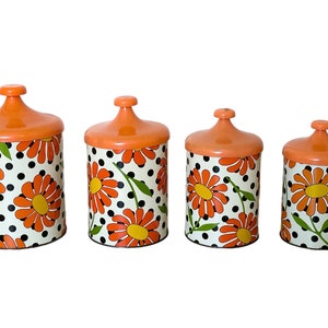 MCM canister set excellent condition mid-century modern boho 1960s 1970s set if 4 orange and yellow floral enamel nesting kitchen canisters