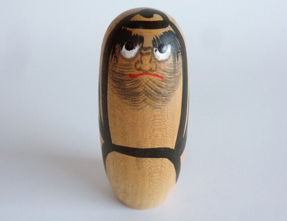 wooden daruma doll