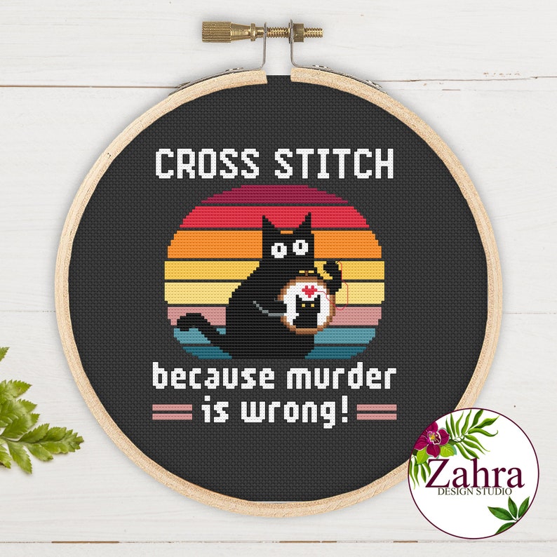 Funny xross-stitch embroidery featuring a black cat doing cross stitch. The design is set against a sunset background with text that reads "CROSS STITCH because murder is wrong!"
