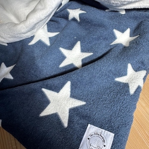 snuggle sacks and blankets perfect for dogs and cats in a lovely navy star design.  cute and cosy. perfect for at home and travel