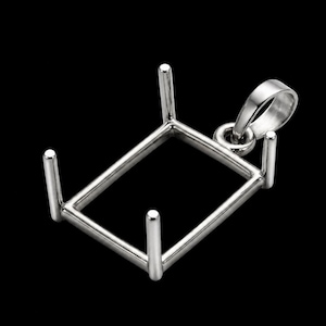 May include: A silver-colored pendant setting with a rectangular frame and four prongs. The setting includes a loop for a chain. The design is simple and modern, suitable for jewelry making.