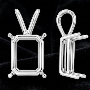 May include: Two silver-toned metal pendant settings for gemstones. One setting is shown from the front with a rectangular frame and four prongs, and the other is shown from the side, displaying the vertical structure and a rounded bail at the top.