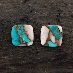 May include: Two square-shaped turquoise cabochons with copper and pink accents. The stones have a mottled pattern of turquoise, copper, and pink.
