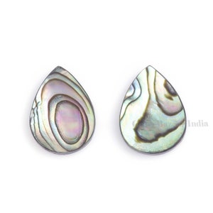 May include: Two iridescent abalone shell teardrop shaped earrings. The shells have a green, blue, and purple color pattern.