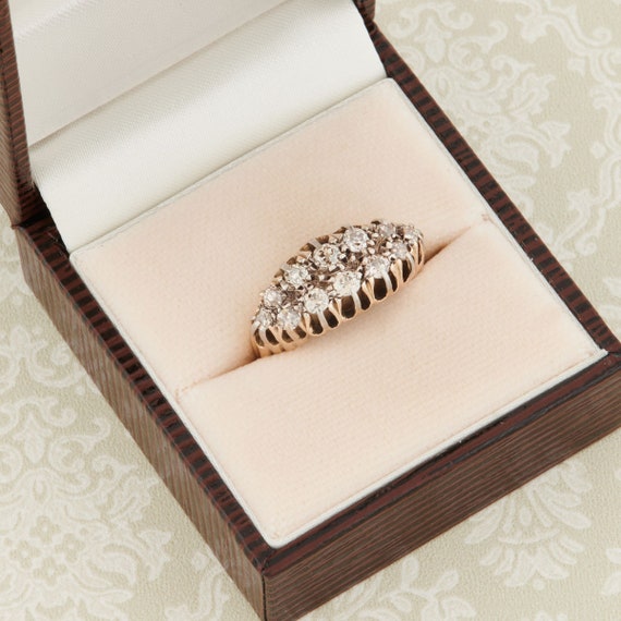 Boat shaped diamond cluster ring deals