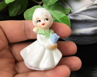 Figurina vintage Napco in miniatura della ragazza dei fiori