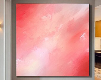 Op de afbeelding: Abstract schilderij in roze en witte kleuren. Het schilderij heeft een zachte, dromerige uitstraling en is perfect om elke kamer een vleugje kleur te geven.