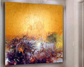 May include: Abstract painting with gold, purple and green hues. The painting is hanging on a wall in a room with white walls and a white ceiling. There are two white benches with metal legs in front of the painting.