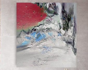 May include: Abstract painting with red, blue, green, and white paint on a canvas. The painting is hanging on a wall in a modern living room with a wooden floor, a table, and white stools.